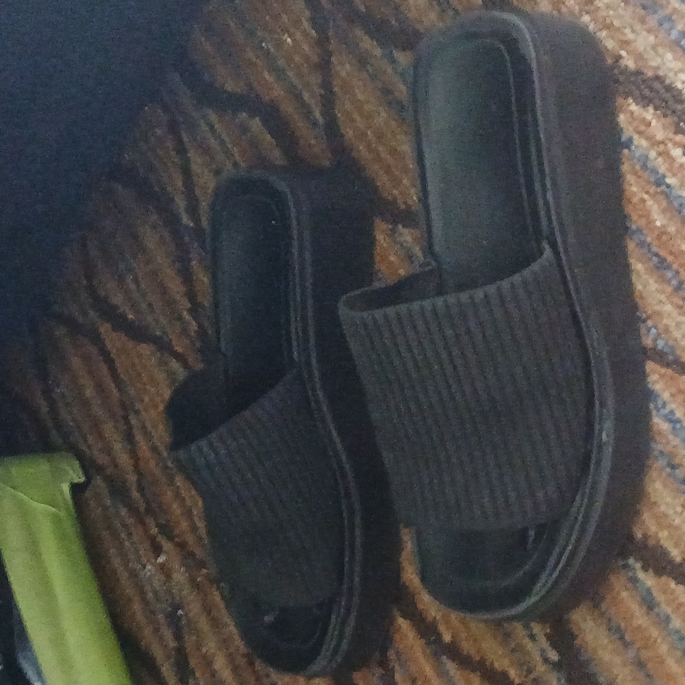 Womens black knit platform sandals.